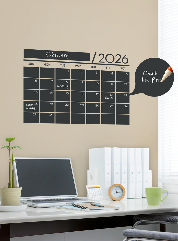 2026 Chalkboard Calendar Wall Decal in home office setting with laptop, plant, and coffee cup for Back to School Collection 2024