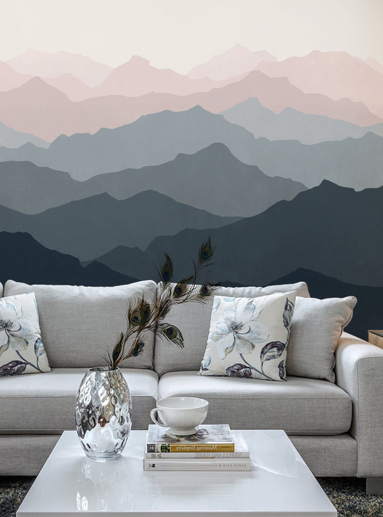 Mountain scenery mural wall art wallpaper with hazy, layered peaks in shades of gray and pink, providing the illusion of depth and spaciousness in a room. Perfect for cozy and modern nurseries, bedrooms, and living rooms. Featured Collection, Top Sellers, Wall Murals, Peel and Stick Wallpaper, Nature Wallpaper, Kids and Baby Nursery Wallpaper, Nature Murals, Scenery Murals, Kids Murals, All Products, Wallpaper and Murals.