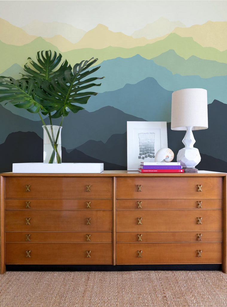A vibrant mountain mural with lush greenery and a serene landscape, adding depth and grandeur to this cozy and modern space. Featured Collection, Top Sellers, Wall Murals, Peel and Stick Wallpaper, Nature Wallpaper, Kids and Baby Nursery Wallpaper, Nature Murals, Scenery Murals, Kids Murals, All Products, Wallpaper and Murals