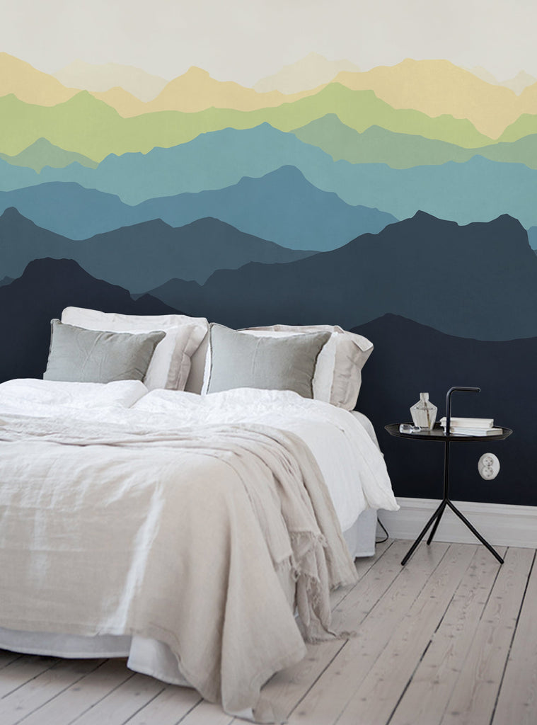 Serene mountain landscape mural in tranquil shades of blue, green, and yellow, creating a soothing and spacious atmosphere for a cozy and modern nursery, bedroom, or living room. Featured Collection,Top Sellers,Wall Murals,Peel and Stick Wallpaper,Nature Wallpaper,Kids and Baby Nursery Wallpaper,Nature Murals,Scenery Murals,Kids Murals,All Products,Wallpaper and Murals