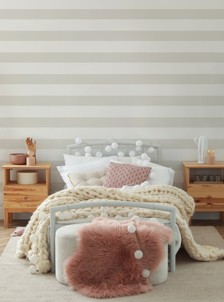 Cozy bedroom setup featuring Horizontal Stripes wallpaper in beige tones, soft bedding, and wooden nightstands for a warm, inviting look