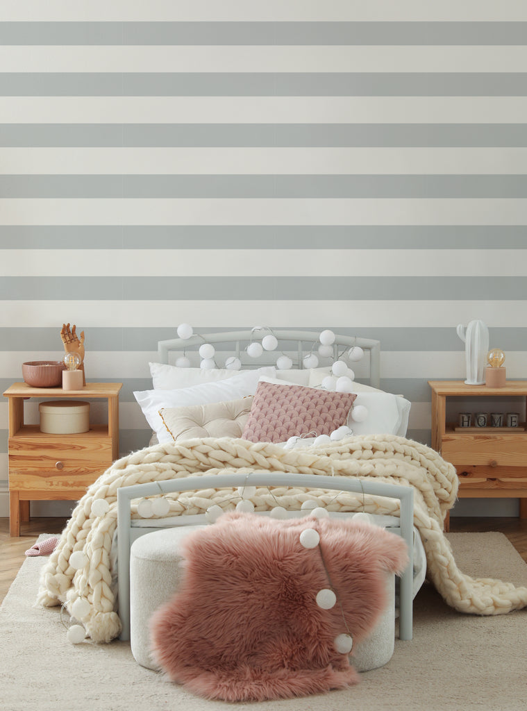 Cozy bedroom featuring elegant horizontal stripes wallpaper from the Beige Collection Catalog with soft neutral tones and warm accents