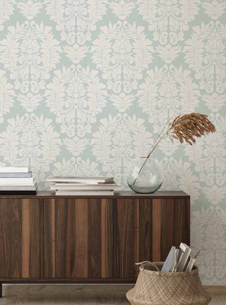 Elegant Damask Classic peel and stick wallpaper in soft beige and green tones displayed with modern decor accents