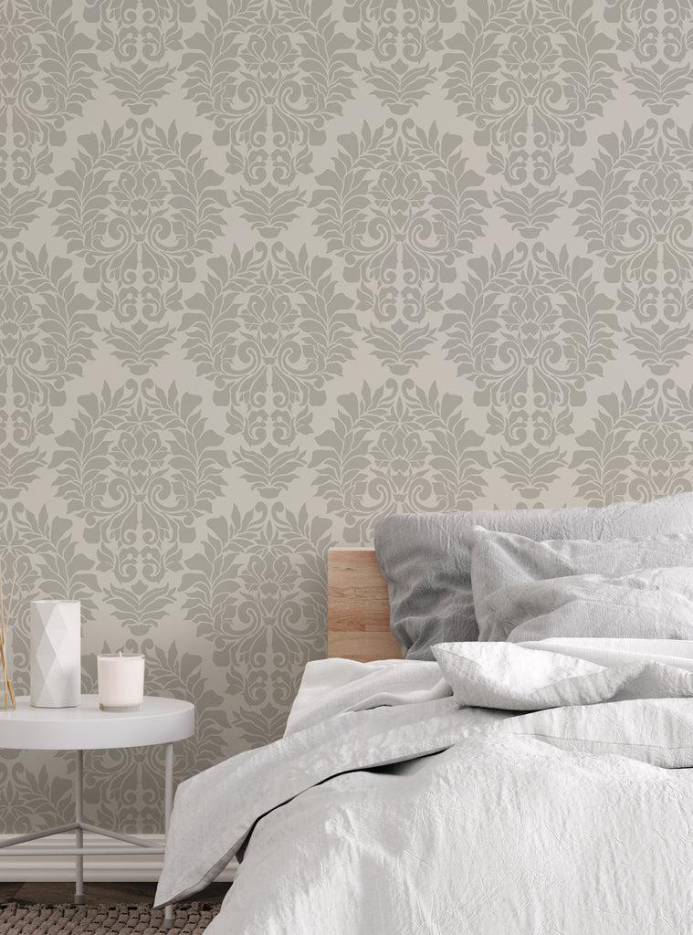 Elegant damask classic color peel and stick wallpaper adding a timeless pattern to a cozy bedroom setting with neutral tones