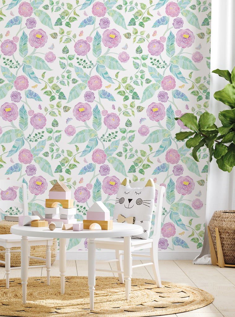 Cozy kids room with playful pastel floral wallpaper featuring purple blossoms and green leaves creating a fresh spring garden vibe