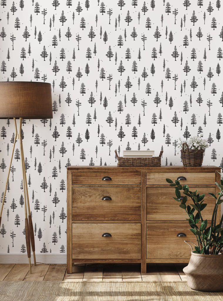 Cozy room featuring Tree With Birds wallpaper in black and white from the Nature Wallpaper collection with rustic wooden furniture