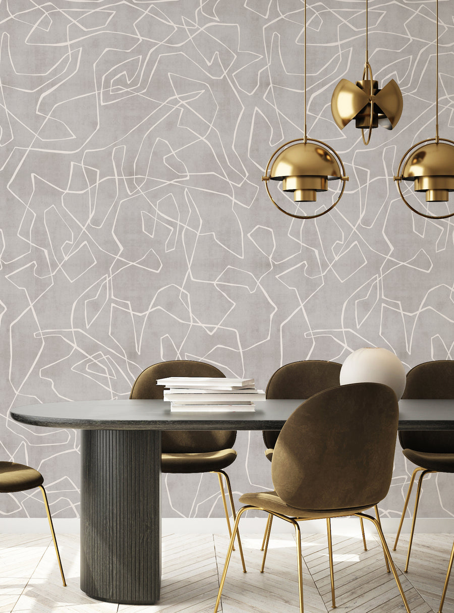 Intricate lines and shapes form a captivating abstract pattern on the wall, creating a contemporary and luxurious look for this dining space. The textured design adds depth and visual interest, while the metallic accents of the pendant lights and chairs complement the overall sophisticated aesthetic. This Entangled Lines Textured Look Background Mural from Simple Shapes would make a beautiful focal point and accent in any room. Featured Collectio
