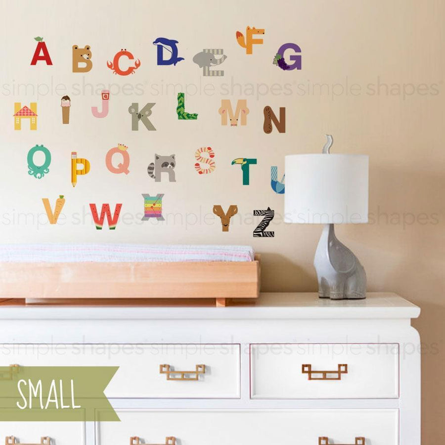 Colorful alphabet wall stickers with various animal and shape designs to help kids learn their ABCs in a fun and engaging way. These reusable, peel-and-stick vinyl decals can be arranged and rearranged on the wall as desired. Suitable for nursery, playroom, or any kid-friendly space. Top Sellers, Wall Stickers, Animal Wall Stickers, Nature Wall Stickers, Pattern Wall Stickers, All Products