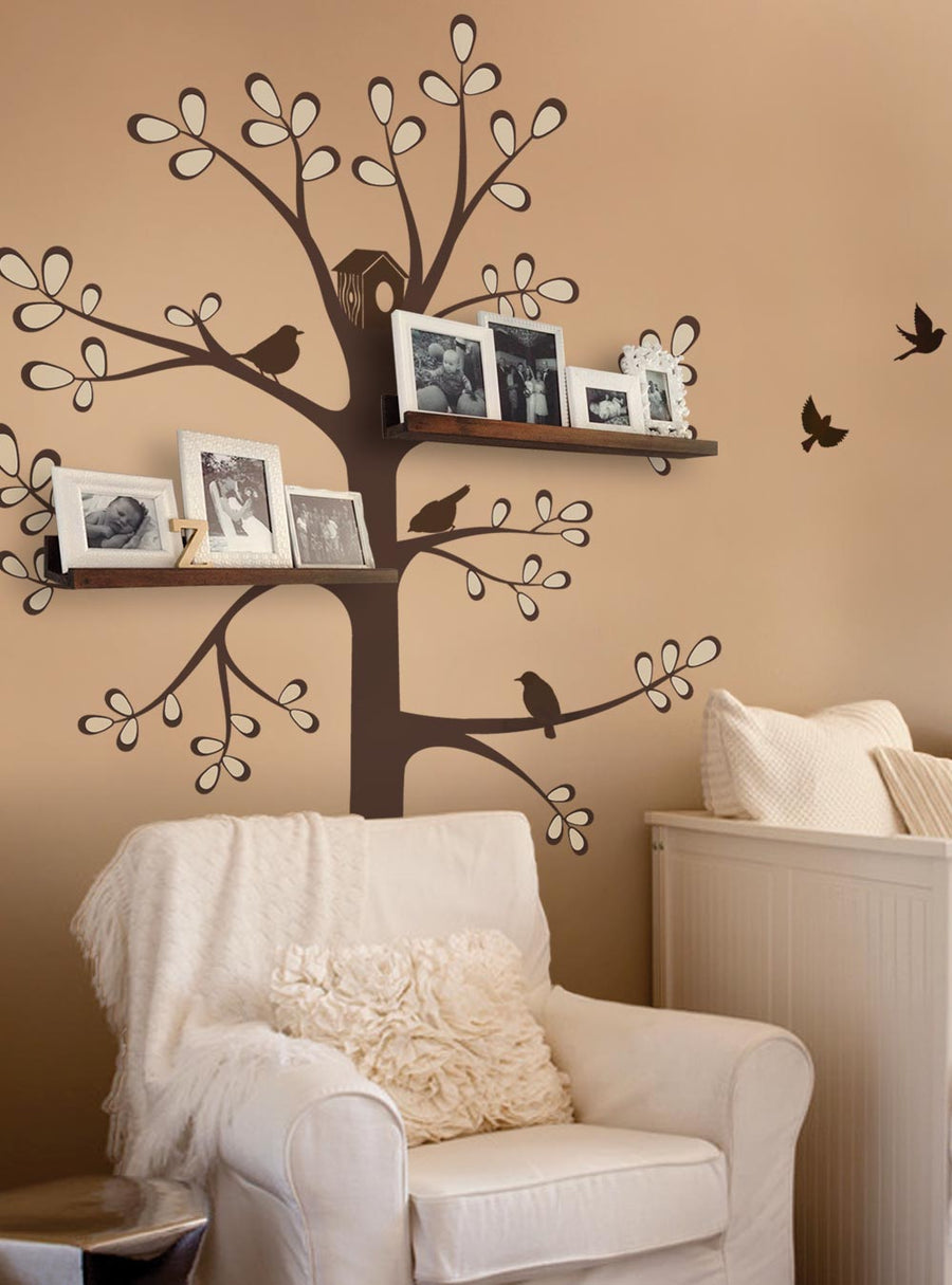 Alt text: Decorative tree decal with shelves and photo frames on a neutral-colored wall, creating a cozy and modern home decor scene. Ideal for a nursery, kid's room, or living space. , Top Sellers,Wall Decals,Animal Decals,Tree Decals,Baby Nursery and Kids Wall Decals,All Products