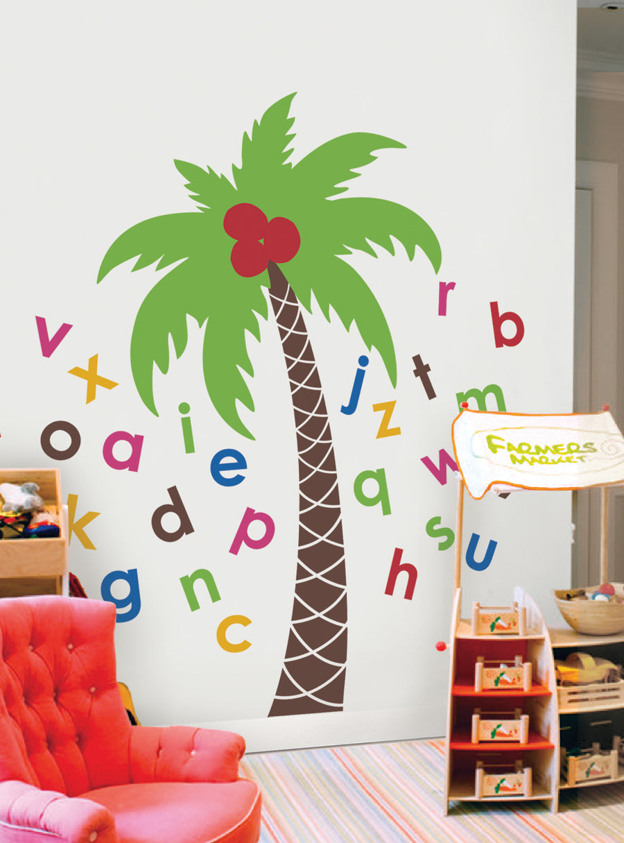 Colorful wall decal featuring a palm tree and alphabet letters, designed to help kids learn their ABC's. The decal includes a large palm tree with vibrant green leaves and a red flower, surrounded by colorful alphabet letters in various sizes and fonts. This engaging and educational product is perfect for adding a touch of fun and learning to any child's room or play area. Featured Collection, Top Sellers, Wall Decals, Tree Decals, All Products
