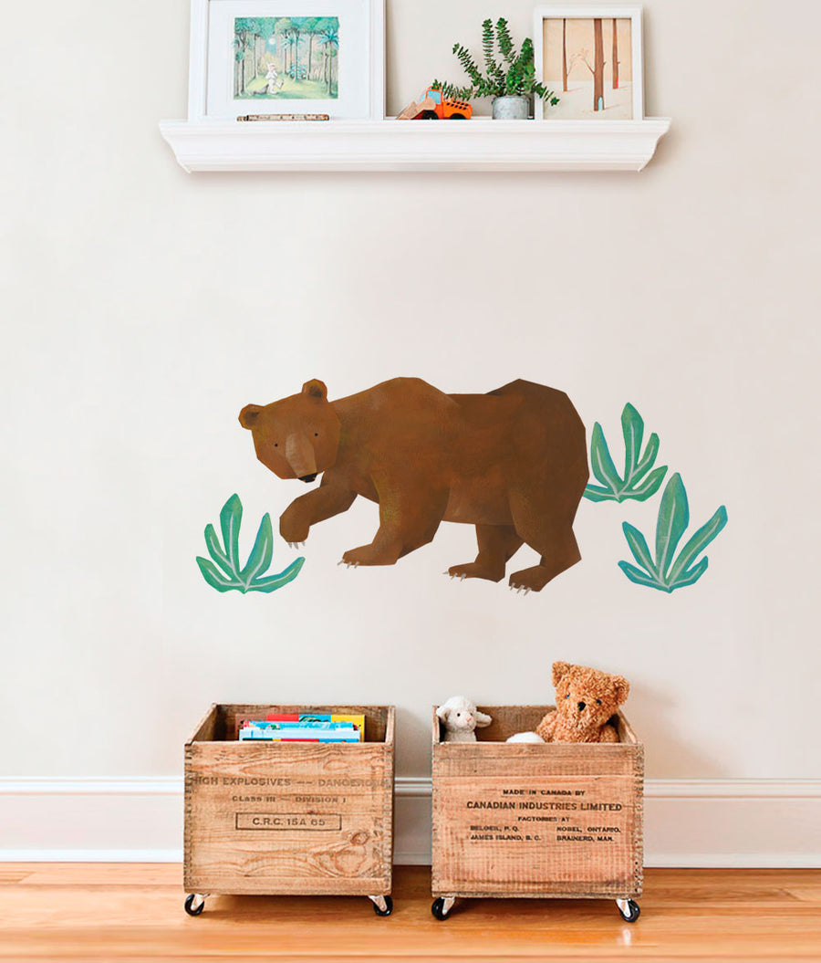 A large bear silhouette surrounded by tropical leaves adorns the wall, adding a whimsical and nature-inspired touch to the room. This versatile wall sticker can be used to decorate children's bedrooms, playrooms, or other spaces where a touch of wildlife and greenery would be a welcome addition. Top Sellers, Wall Stickers, Floral Wall Stickers, Animal Wall Stickers, Nature Wall Stickers, All Products