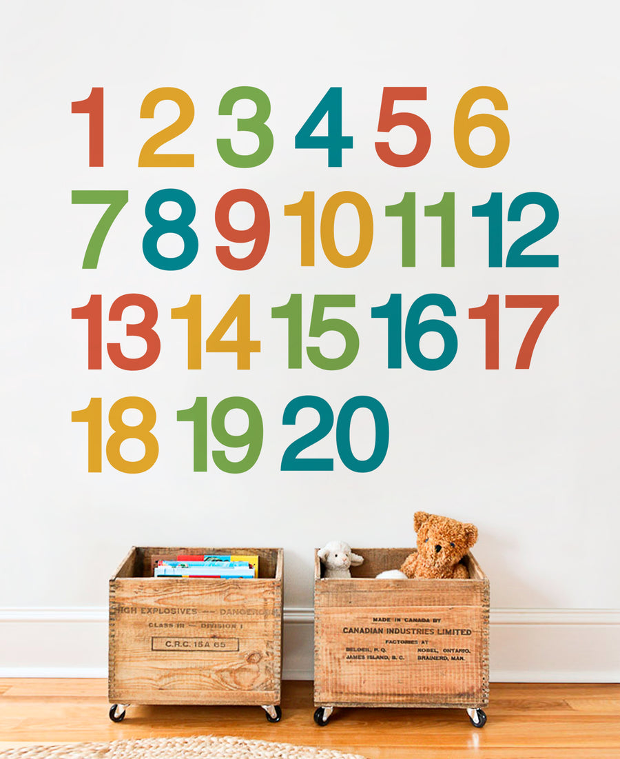 Colorful numbers displayed on a wall, perfect for helping kids learn to count. Ideal for nurseries, playrooms, or classrooms. Eco-friendly vinyl wall decals that are easy to apply and remove without damaging walls. , Top Sellers,Wall Decals,Baby Nursery and Kids Wall Decals,All Products