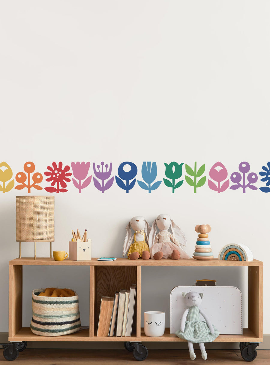 Vibrant, whimsical flower wall stickers bring a touch of nature and playfulness to any child's room, playroom, or nursery. With 18 assorted flower designs in a range of sizes, this peel-and-stick product allows for creative wall decor that transforms the space into a flourishing floral haven. Top Sellers, Wall Stickers, Floral Wall Stickers, All Products, Back To School