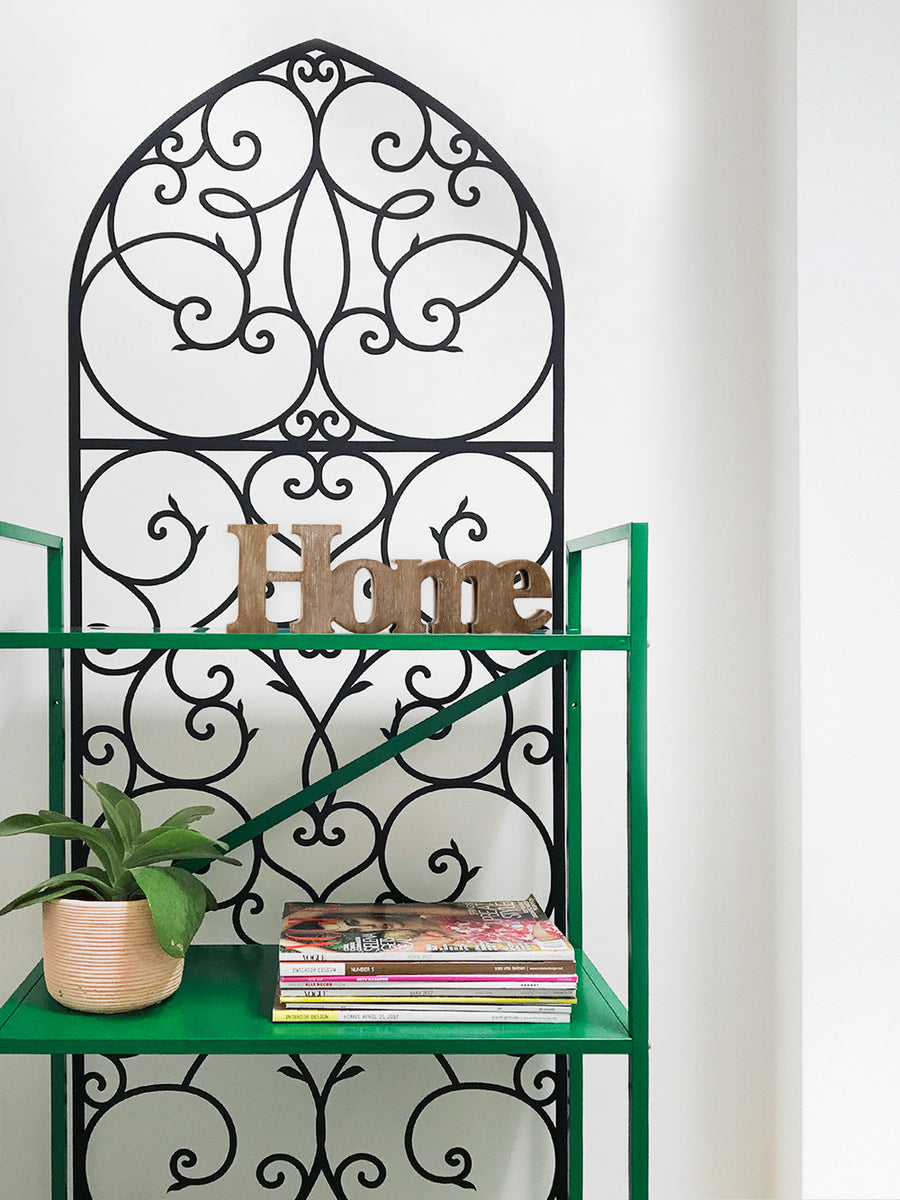Elegant and ornate decorative metal wall panel with intricate scrollwork design, reminiscent of French iron gateways, providing a sophisticated accent for entryways, headboards, or shelving. This versatile self-adhesive wall decal adds a touch of timeless charm to any room. Top Sellers, Wall Decals, All Products