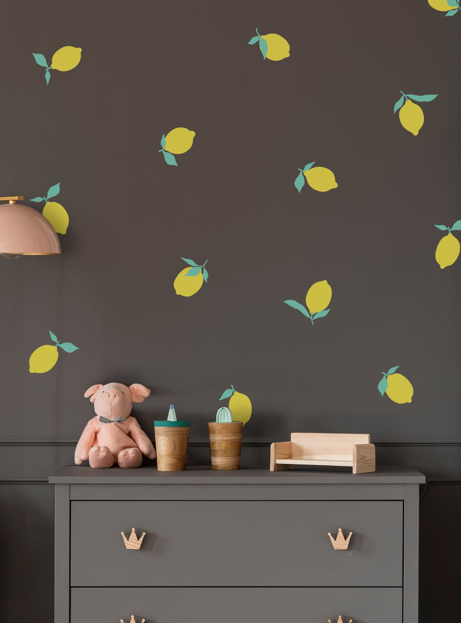 Decorative lemons and leaves adorn this charming Shopify product, creating a vibrant and fresh wall decal perfect for any kitchen, dining room, or cozy nook. With customizable color options and easy application, this eye-catching decal is a must-have for those seeking to add a touch of citrus-inspired style to their living space. , Top Sellers,Wall Decals,All Products