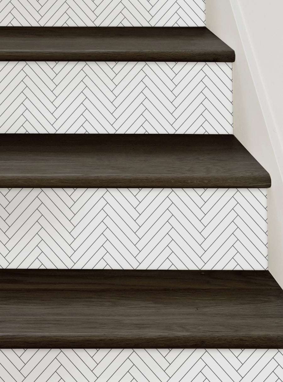 Detailed image of herringbone tile pattern on stair risers, showcasing the modern and customizable design of the Herringbone Tile Peel and Stick Stair Riser Strips. This product allows for easy installation and personalization to enhance the look of any staircase. Top Sellers,Stair Riser Decals,All Products,Geometric Pattern Stair Riser Stickers