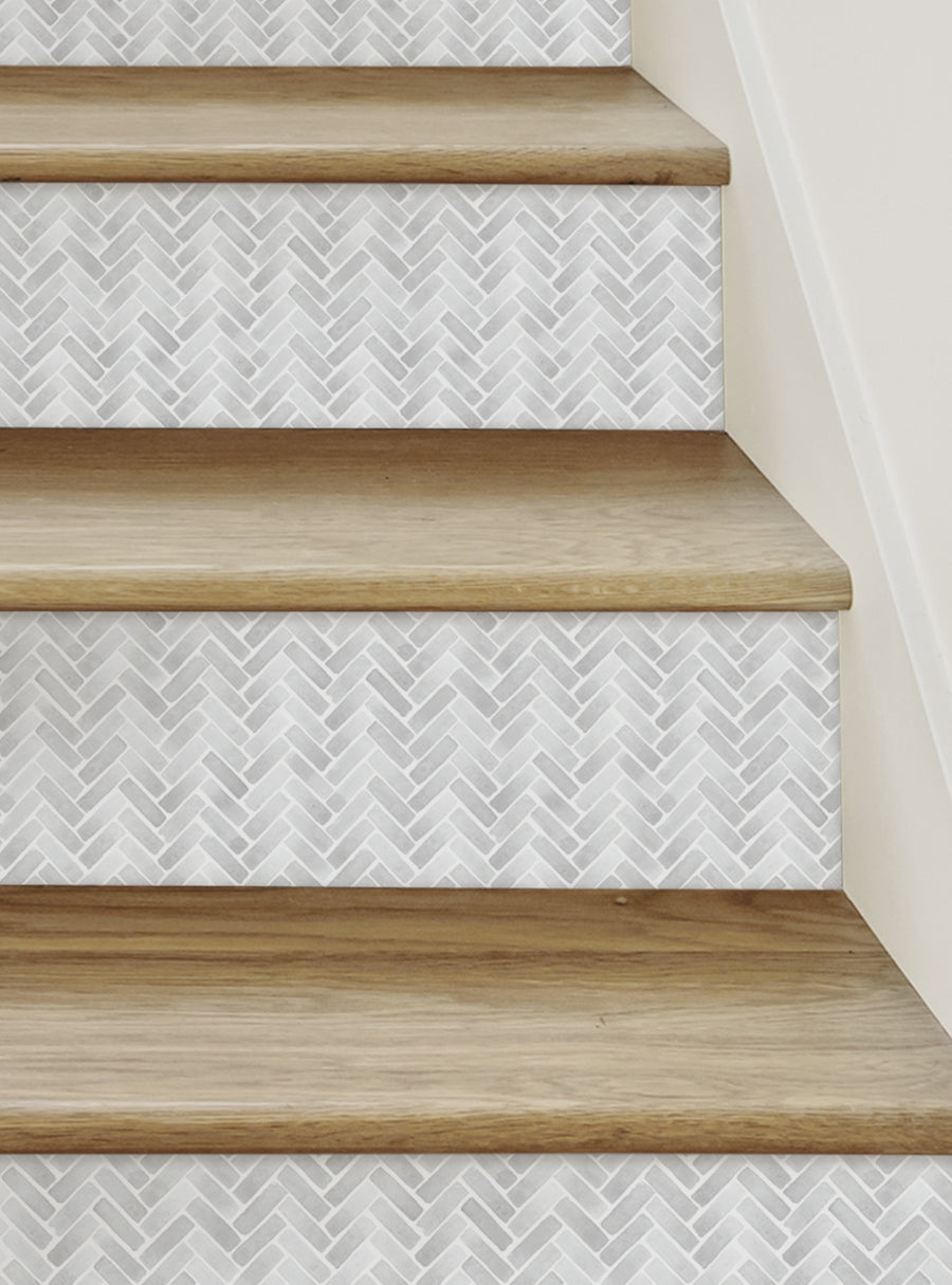 Elegant herringbone pattern on stairs accentuates the contemporary design, perfect for transforming stairs with a luxurious and modern look. Watercolor-inspired herringbone vinyl stair risers provide an easy DIY solution for a quick room makeover without hassle. , Top Sellers,Stair Riser Decals,All Products,Geometric Pattern Stair Riser Stickers
