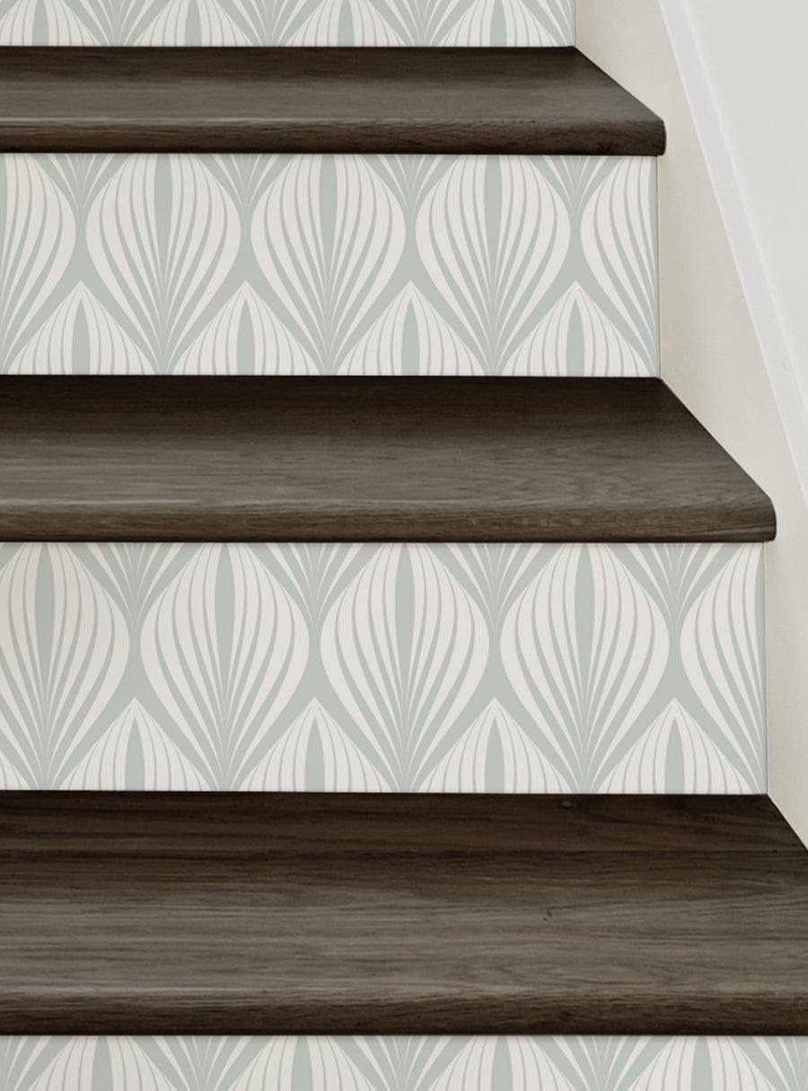 Elegant modern leaves peel and stick stair riser strips, featuring an abstract floral design that adds a subtle yet sophisticated touch to your stairs. These repositionable vinyl decals are easy to apply and remove, making DIY home decor a breeze. Top Sellers, Stair Riser Decals, All Products, Nature and Floral Stair Riser Stickers.