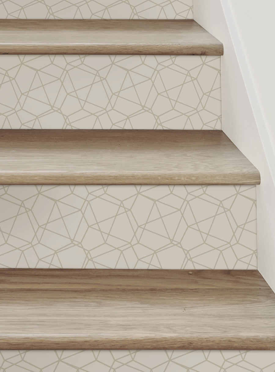 The modern wire mesh peel and stick stair riser strips in the image feature a geometric pattern design that adds a stylish touch to stairs. The repositionable vinyl can be easily applied and removed without any mess, making DIY decor a breeze. , Top Sellers,Stair Riser Decals,All Products,Geometric Pattern Stair Riser Stickers