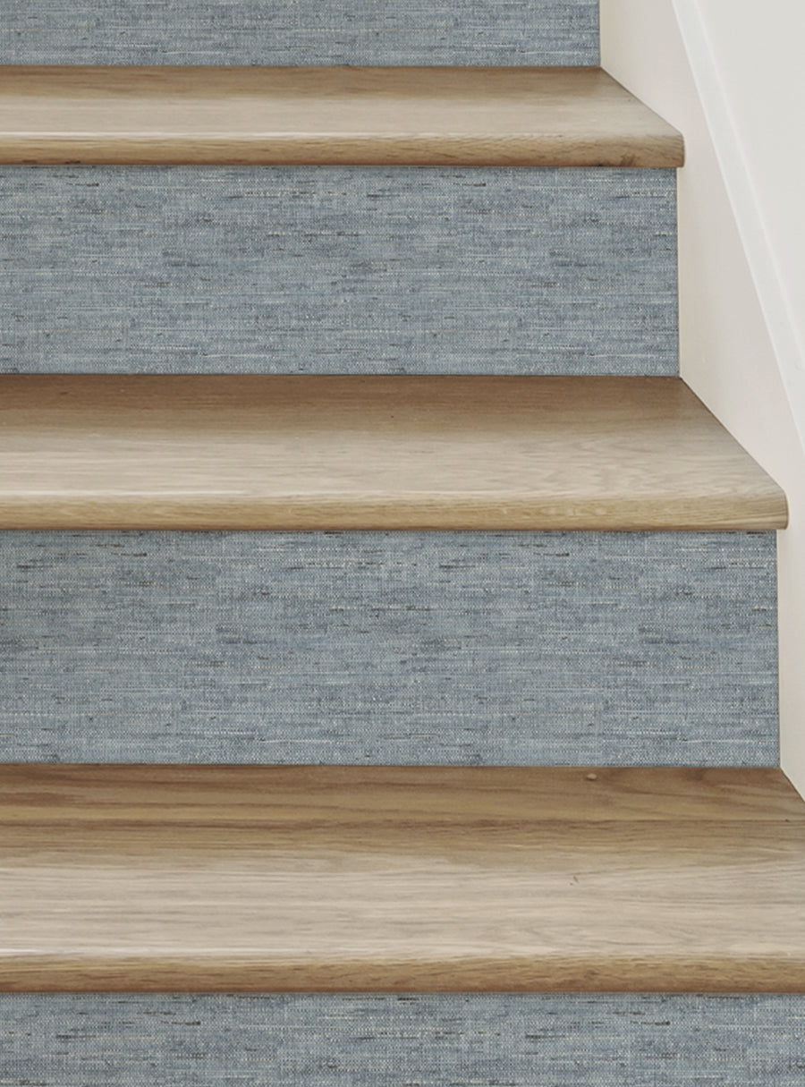 Canvas Look Peel and Stick Stair Riser Strips, a set of vinyl themed design stair riser stickers perfect for adding a unique, creative touch to your steps while providing a soft, felt-like look and feel. Available in 4 colors to complement various decor styles, these repositionable, DIY-friendly stickers can be easily applied and removed without any mess or stress. Designed and made in New Jersey, these versatile stair riser decals offer a Surfac