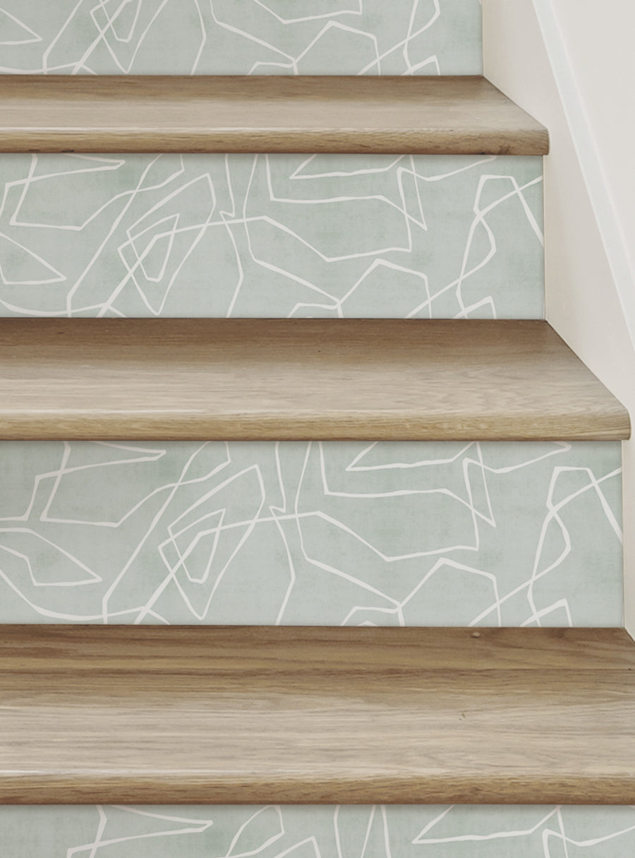 Elegant and modern stair riser with an entangled lines textured look, featuring a premium adhesive backing for a mess-free and stress-free application. This peel and stick design can be easily repositioned and reused, adding a touch of contemporary flair to your stairs. Featured Collection, Top Sellers, Stair Riser Decals, All Products, Geometric Pattern Stair Riser Stickers, Nature and Floral Stair Riser Stickers.