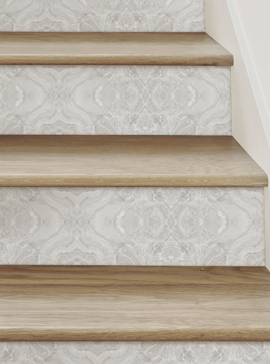 Decorative patterned marble stair risers with a warm, natural stone aesthetic. These high-quality, adhesive-backed vinyl strips can be easily applied, removed, and repositioned without leaving a mess. Featured Collection,Top Sellers,Stair Riser Decals,All Products,Surface and Texture Look Stair Riser Stickers