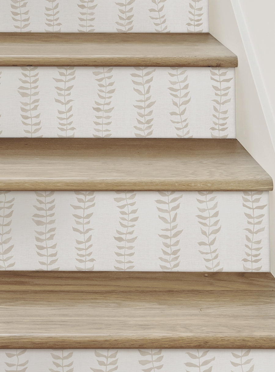 Climbing Vines pattern on stair risers, featuring delicate leafy vines that add a touch of nature and sophistication to your staircase. Versatile, removable, and reusable stair riser decals perfect for updating your home decor. Featured Collection, Top Sellers, Stair Riser Decals, All Products, Nature and Floral Stair Riser Stickers.