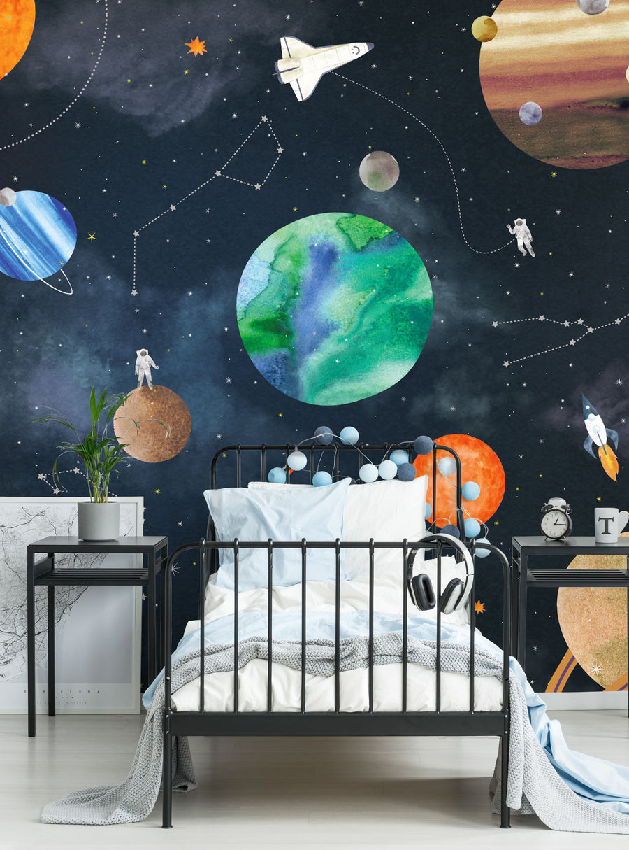 Whimsical outer space scene with planets, stars, and astronauts, perfect for an immersive and engaging kids' room. This mural captures the wonder and adventure of exploring the cosmos. , Top Sellers,Wall Murals,Peel and Stick Wallpaper,Nature Wallpaper,Kids and Baby Nursery Wallpaper,Nature Murals,Kids Murals,All Products,Wallpaper and Murals