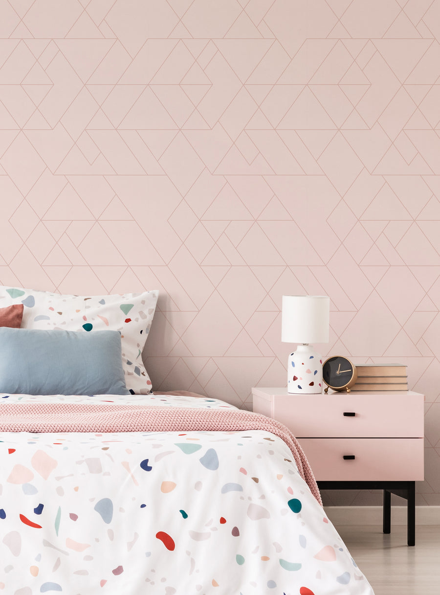 Detailed image of a modern, stylish bedroom featuring a geometric triangle pattern wallpaper in neutral tones. The wallpaper creates a visually striking and contemporary backdrop, complementing the minimalist furniture and decor elements. This wallpaper design would be a great choice for adding a touch of geometric sophistication to any space. , Top Sellers, Peel and Stick Wallpaper, Geometric & Pattern Wallpaper, All Products, Unpasted Wallpaper