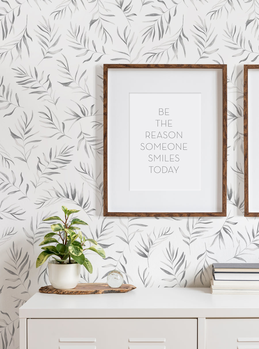 Beautiful tropical foliage adorns the walls, creating a serene and tranquil atmosphere. The image showcases the Breezy Palm Leaves Peel and Stick Wallpaper, a nature-inspired design that adds a touch of exotic flair to any room. This visually stunning wallpaper is perfect for bringing a breath of fresh air and relaxation to your space. , Top Sellers,Peel and Stick Wallpaper,Floral Wallpaper,Nature Wallpaper,Kids and Baby Nursery Wallpaper,All Pro