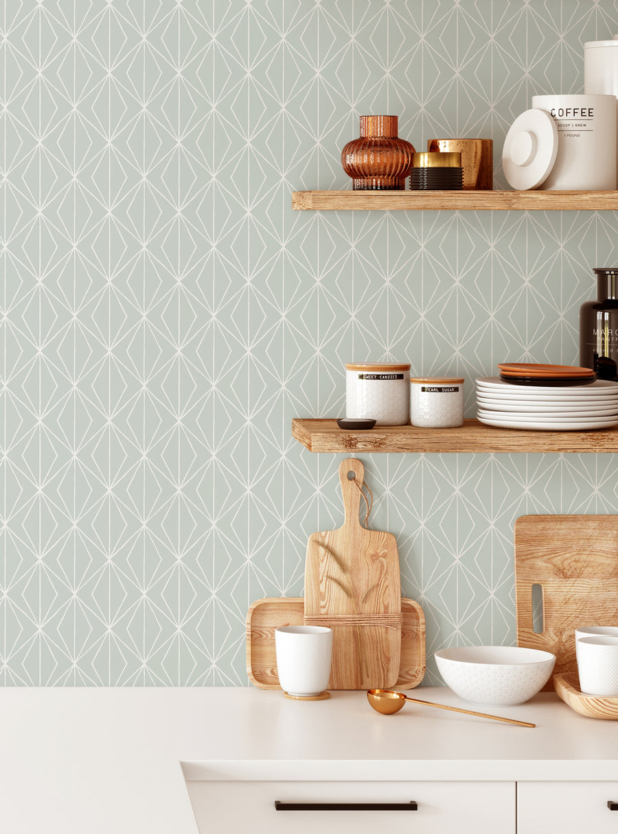 Detailed image of a modern kitchen interior with wooden shelves displaying various decorative items and kitchenware. The walls feature a geometric diamond pattern wallpaper in a soothing light green color, adding visual interest to the space. The overall aesthetic is a blend of natural materials and contemporary design elements, creating a warm and inviting atmosphere. , Top Sellers, Peel and Stick Wallpaper, Geometric & Pattern Wallpaper, All Pr
